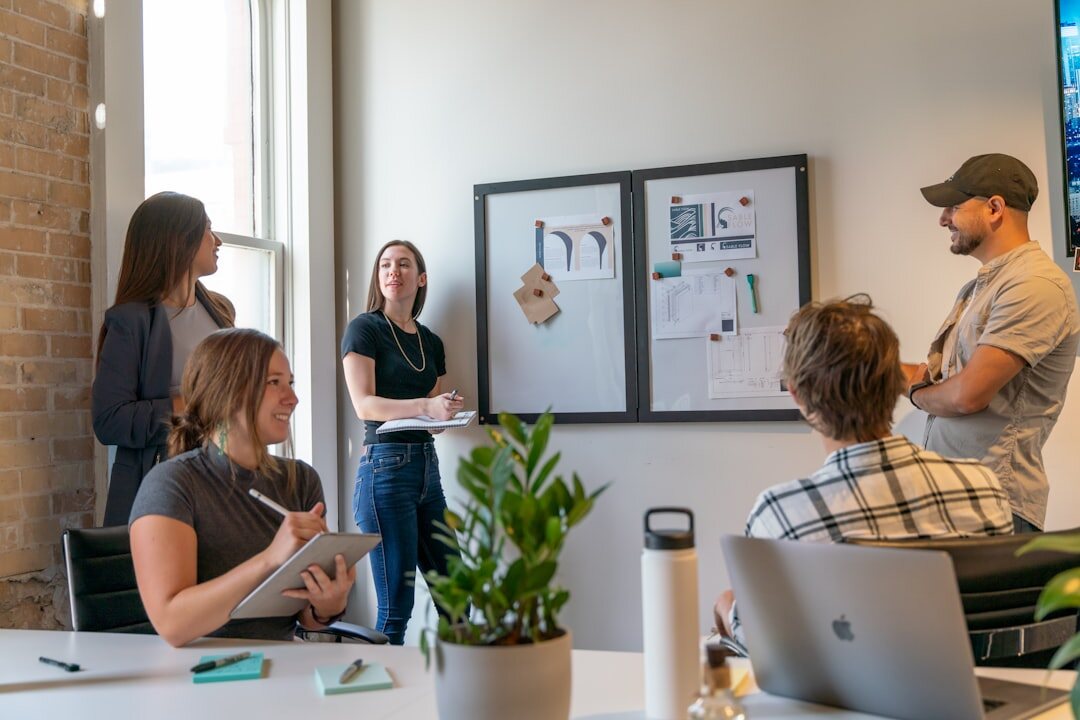 News production team in a modern office collaborating